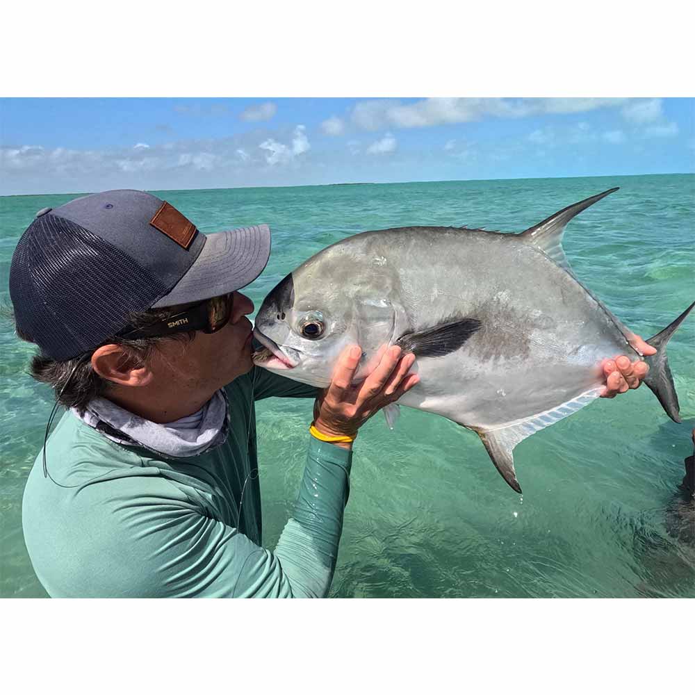 Captain Tuck Scott with a beautiful permit