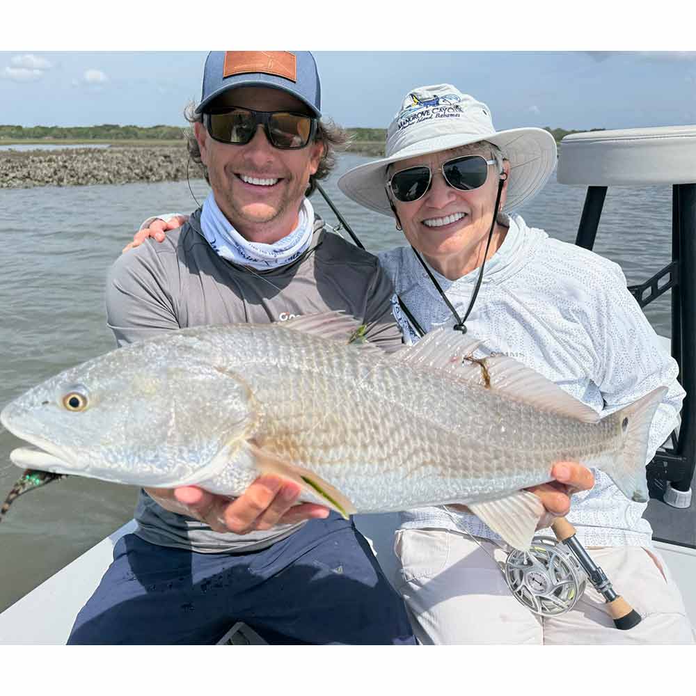 Captain Tuck Scott with a happy client 