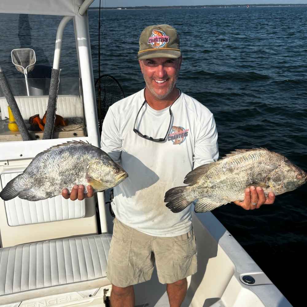 Captain Patrick Kelly with a pair of nice tripletail