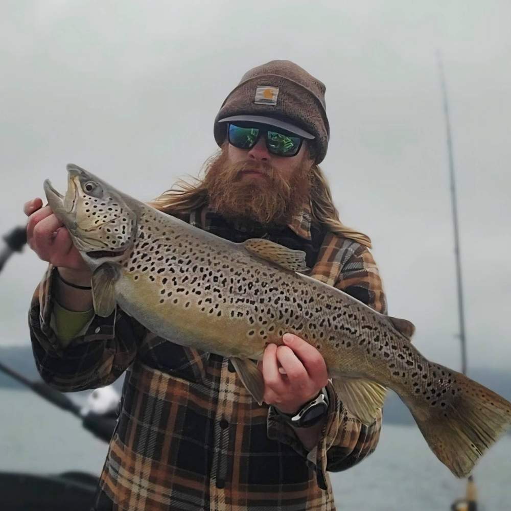 Guide Casey Jones with a monster Jocassee brown trout
