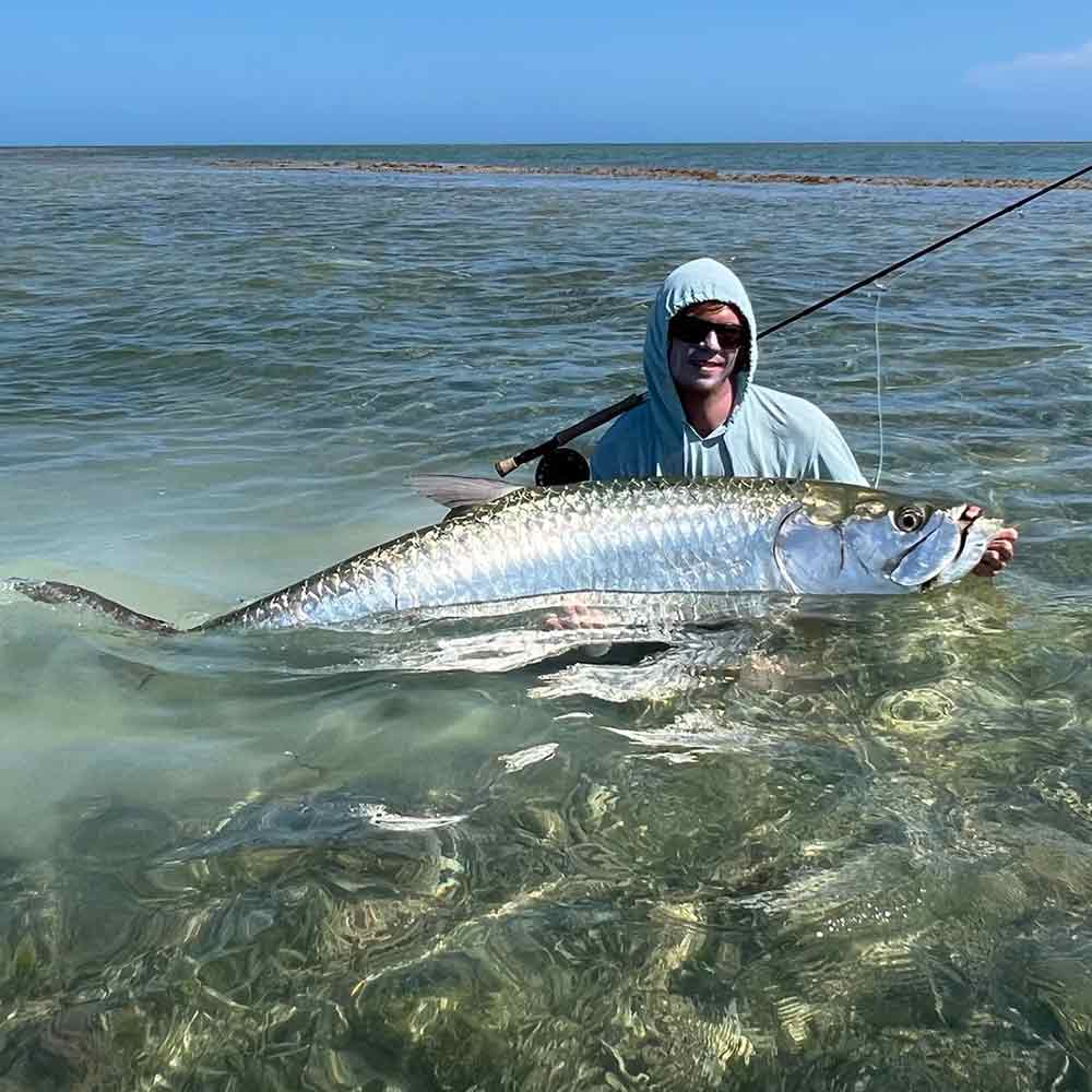 Captain Addison Rupert in the Lower Keys with a tarpon - soon silver kings will be showing up in SC, too