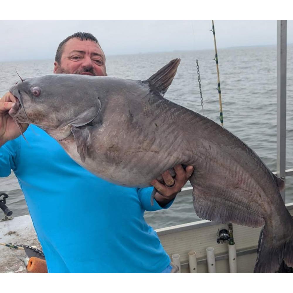 Captain Chris Simpson with a giant
