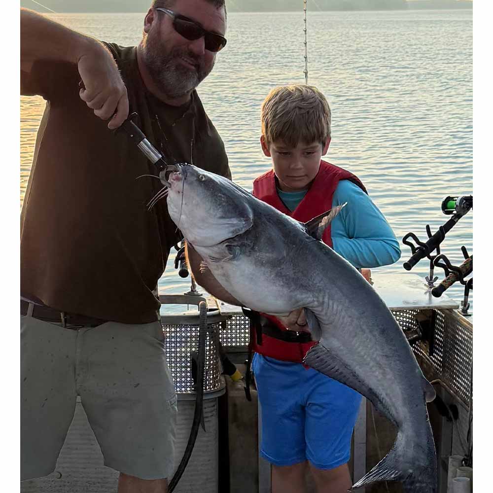 Captain Chris Simpson holds up a good one