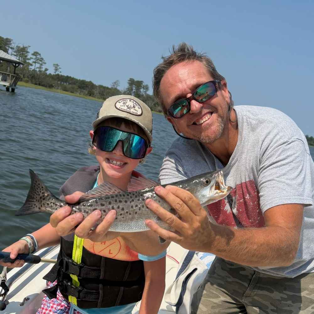 Captain Ron Davis and a young client this morning