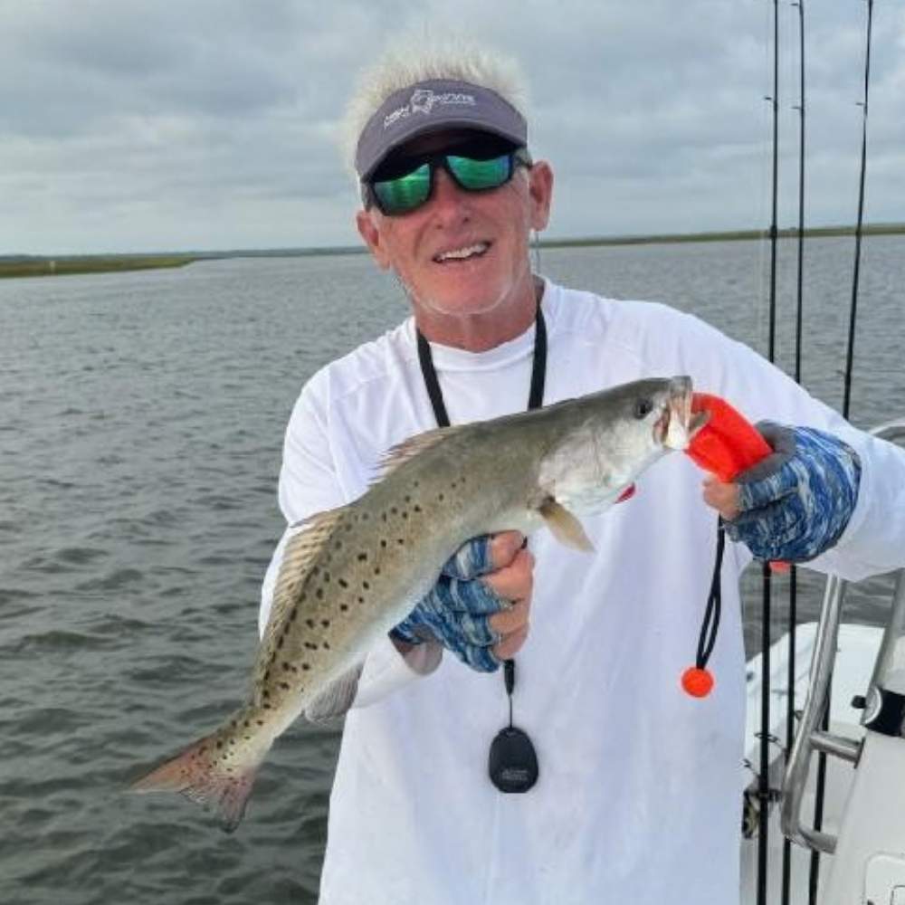 Captain Greg with a 19-inch trout