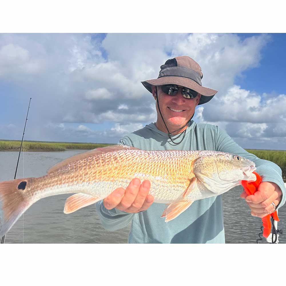 Craig Dawsey on Captain Greg Holmes's boat 