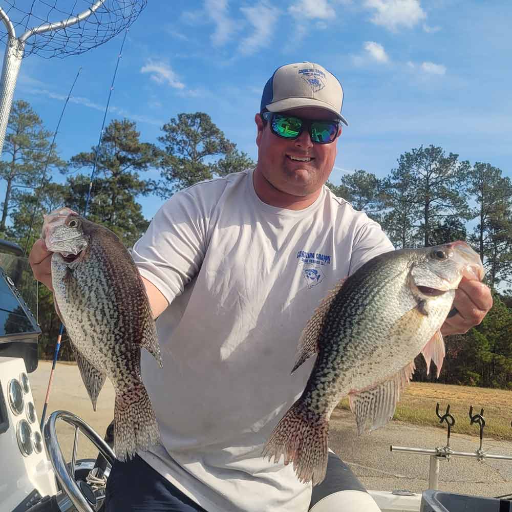 Captain Roland Addy with a couple of Clarks Hill beauties 