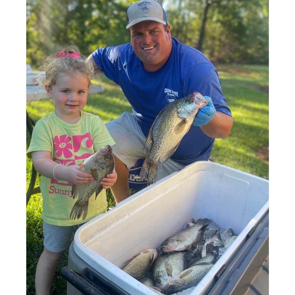 Captain Roland Addy with his fishing buddy