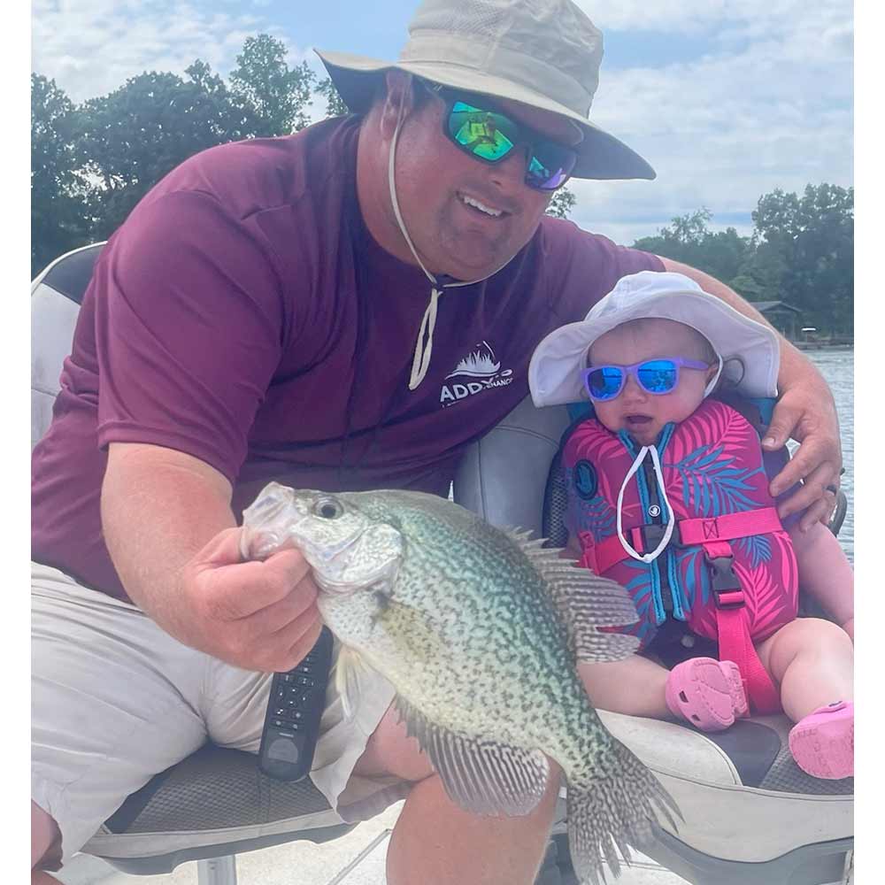 Captain Roland Addy and his fishing buddy