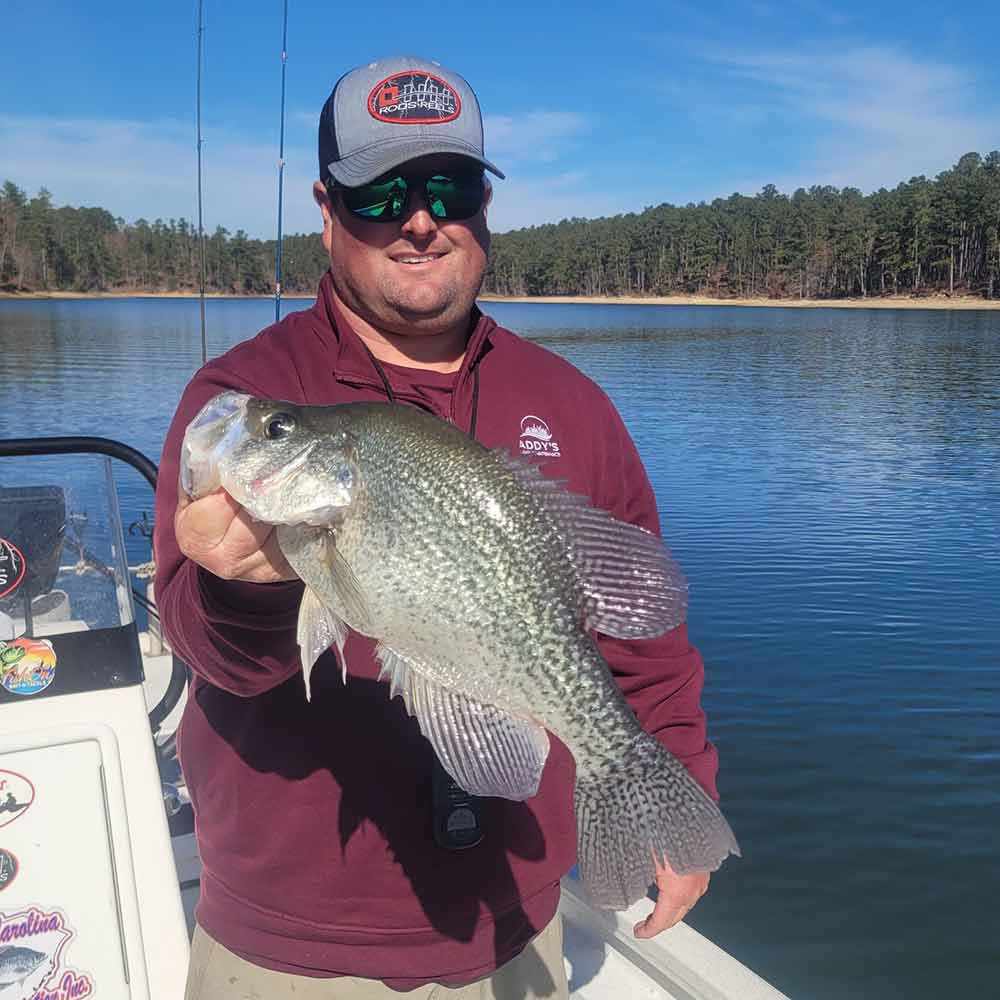 Captain Roland Addy with a 2+ pound slab