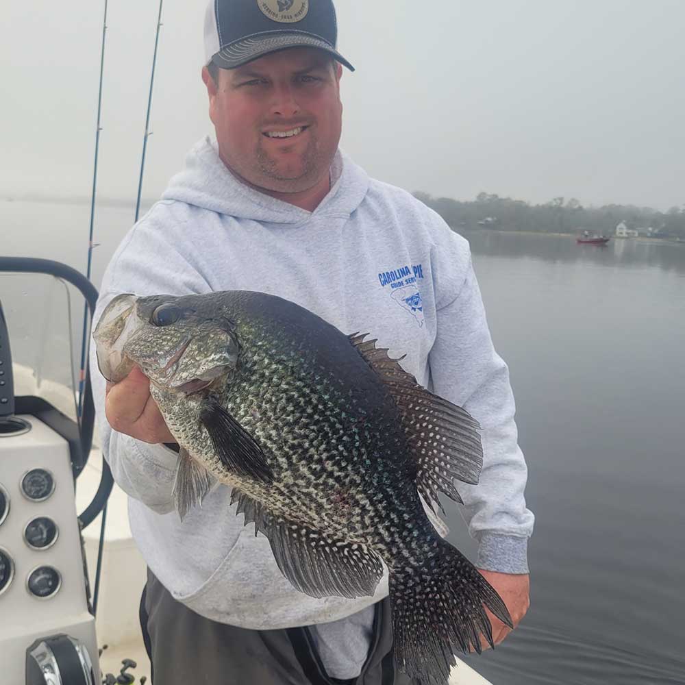 Captain Roland Addy with a slab