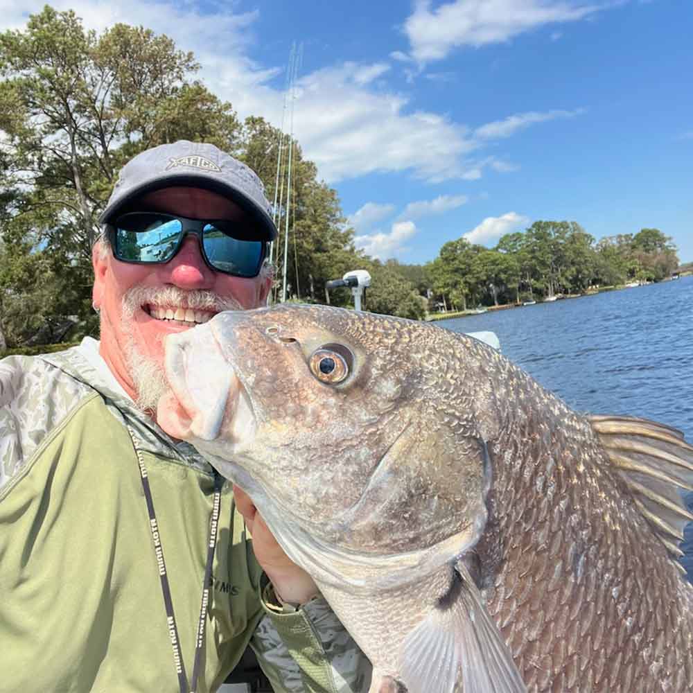 Captain Trent Malphrus with a nice lagoon black drum