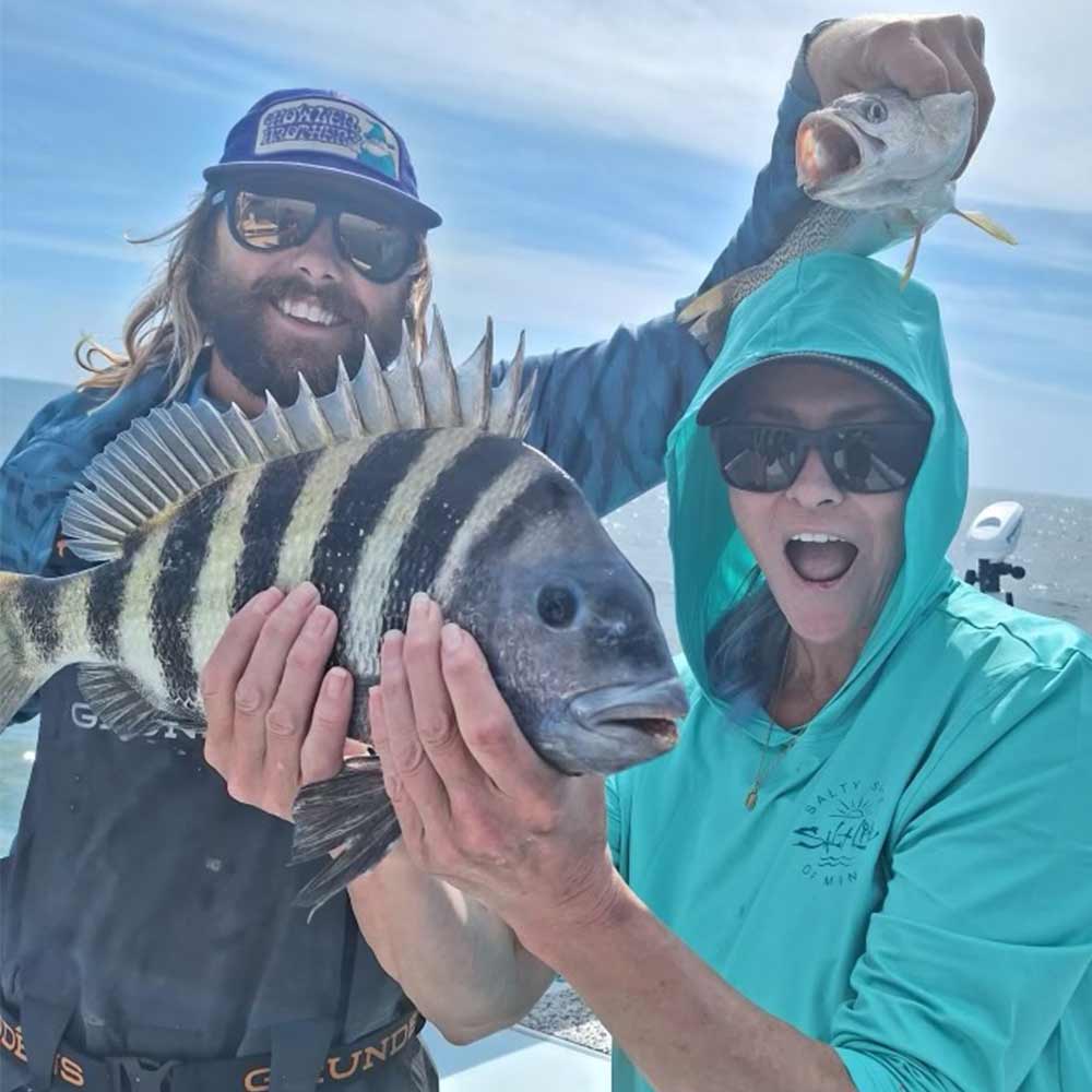 Captain Kai and a happy client horsing around