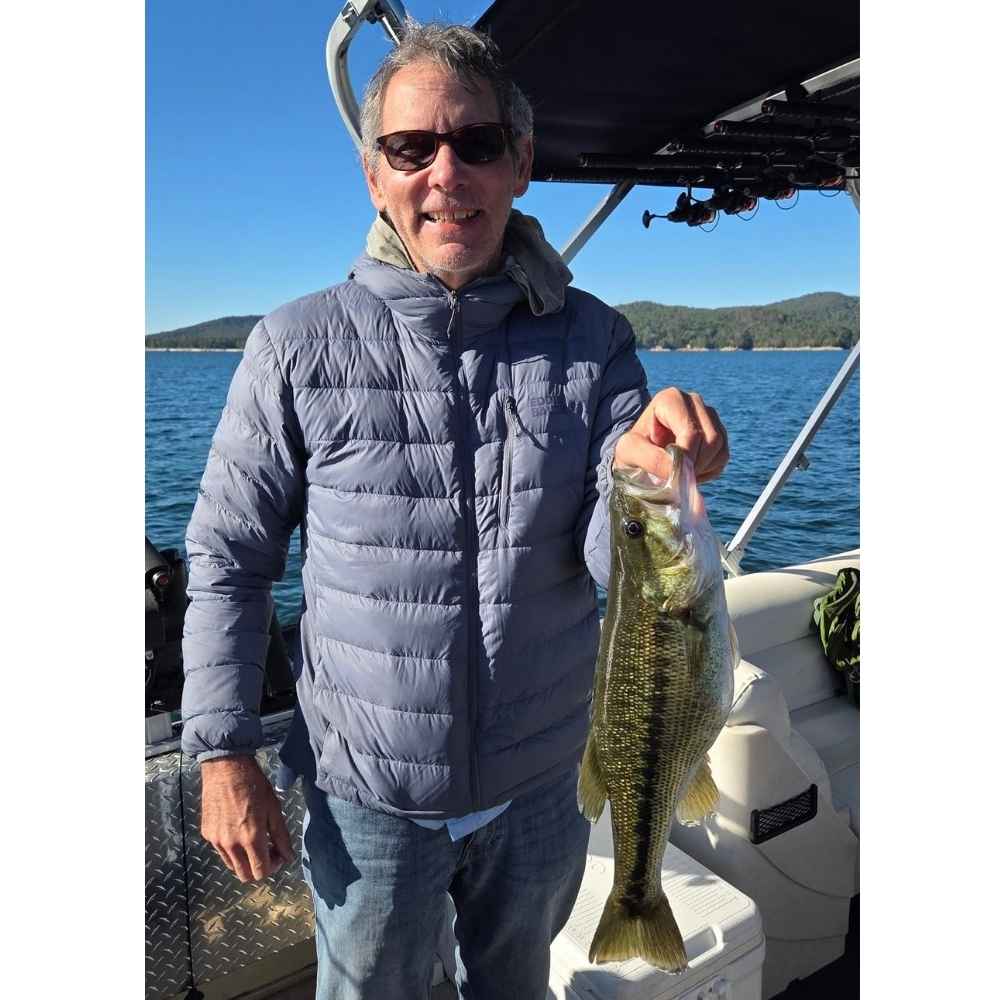 A fat spotted bass caught this week with Jocassee Charters