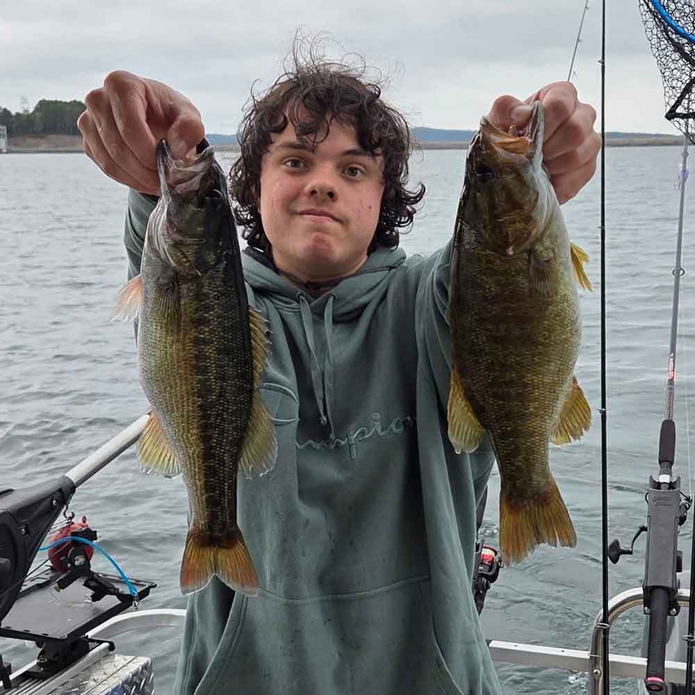 A fat smallmouth out of deep water with Guide Sam Jones