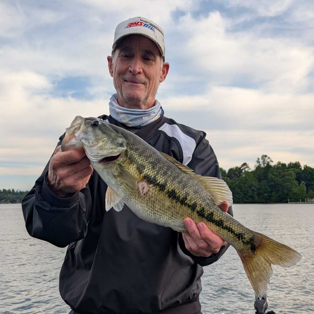 A nice post-spawn bass caught on top with Guide Charles Townson