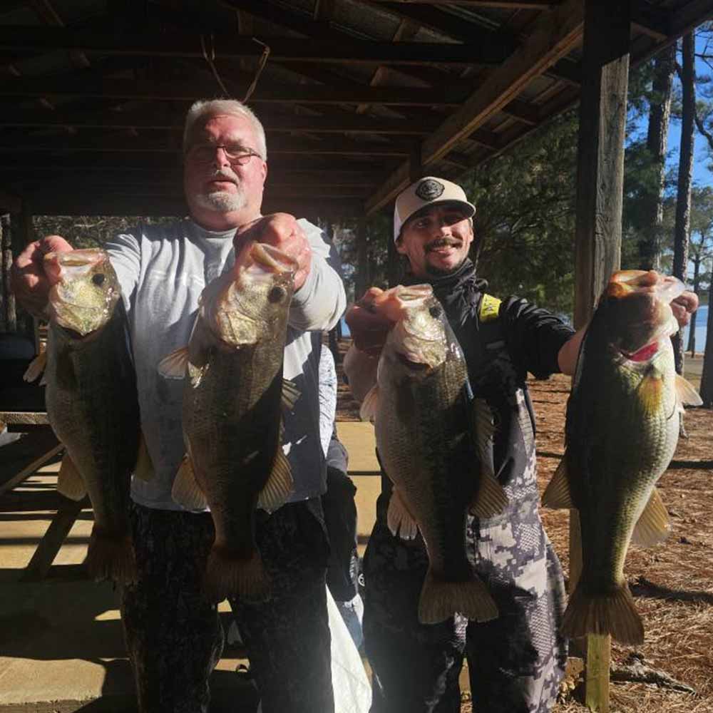 Jeff Douglas and Hunter Enlow with their winning bag 