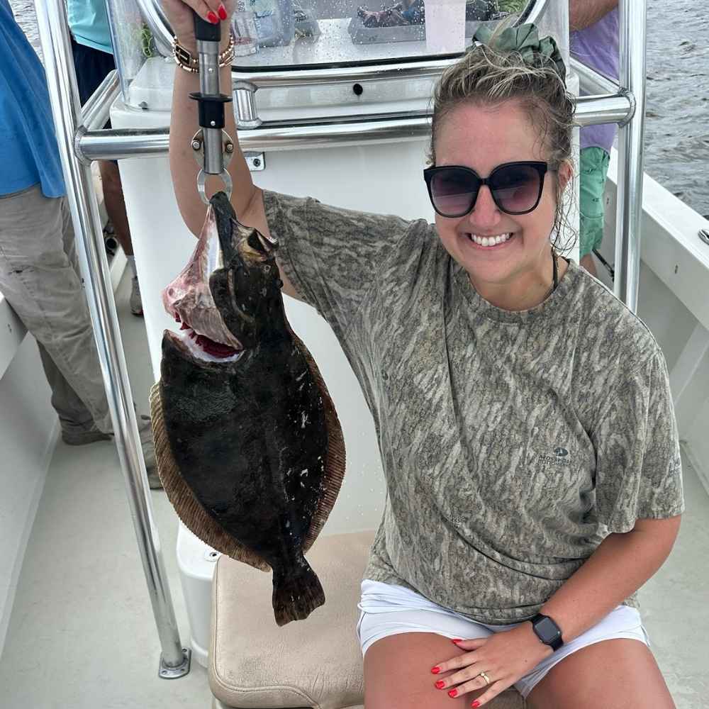 A nice Little River flounder caught with Captain Smiley Fishing Charters