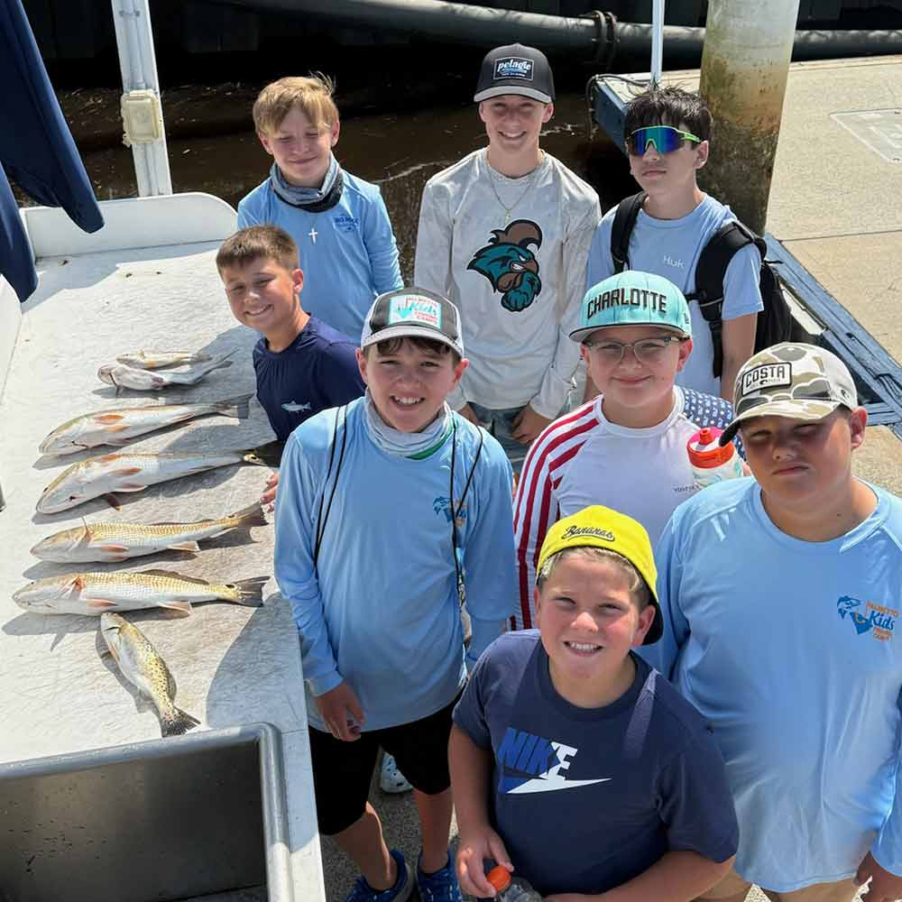 Happy campers with Captain Smiley Fishing Charters