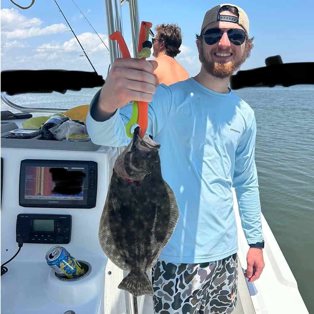 A good flounder this week with Captain Smiley Fishing Charters