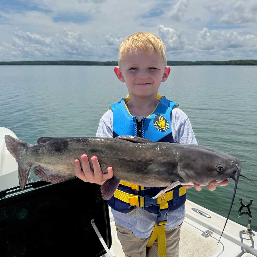 Guide Jerry Kotal's grandson with a nice channel cat