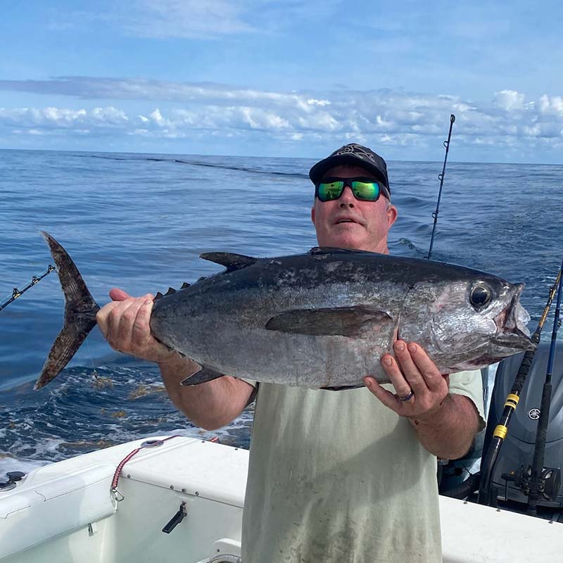 Captain Tom Cushman with a nice tuna