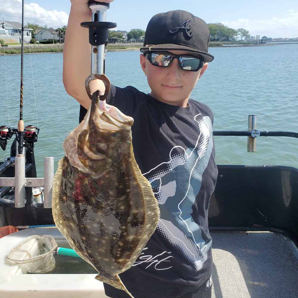 A nice flounder caught this week with Fish Finder Fishing Charters
