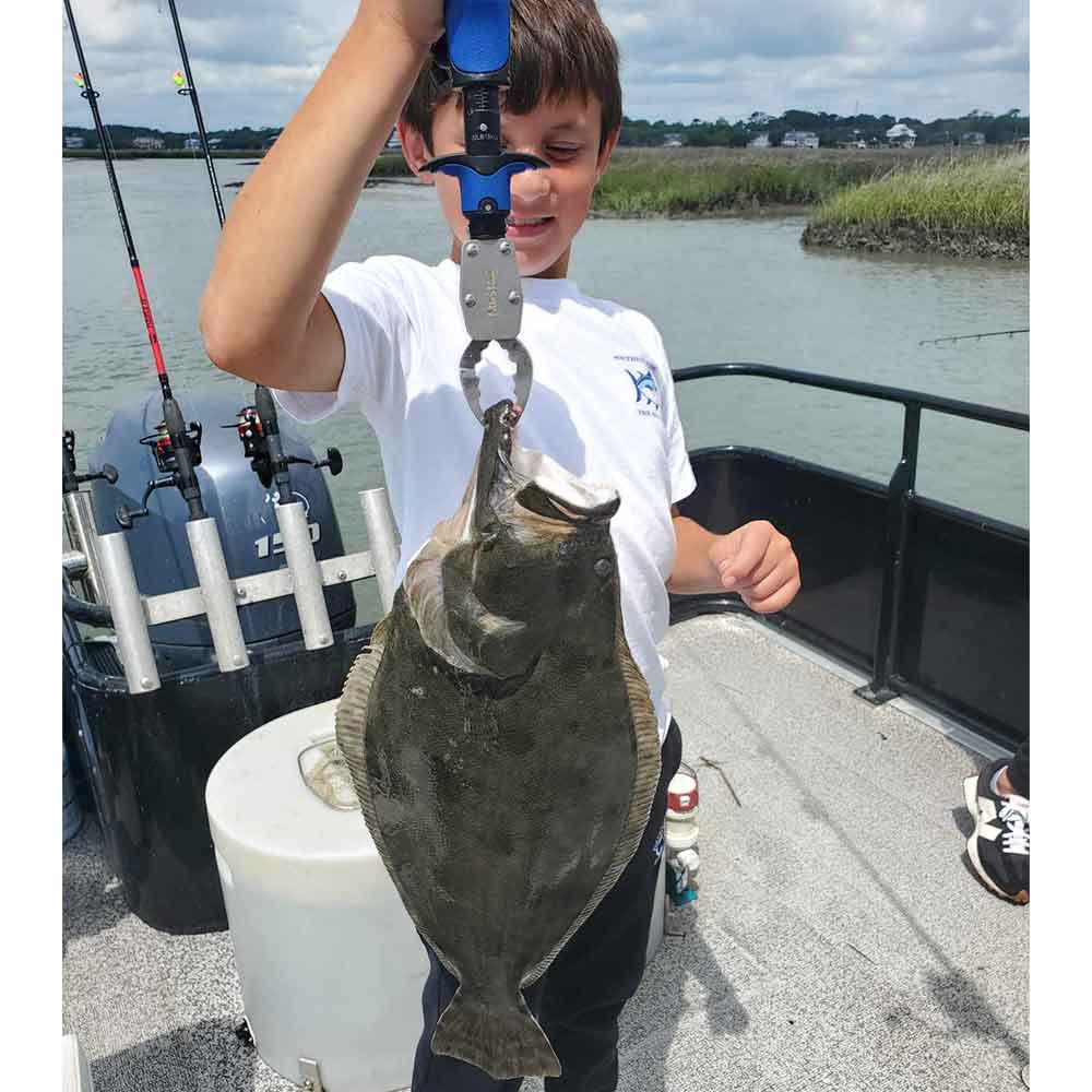 One of MANY big flounder caught this week with Fish Finder Fishing Charters