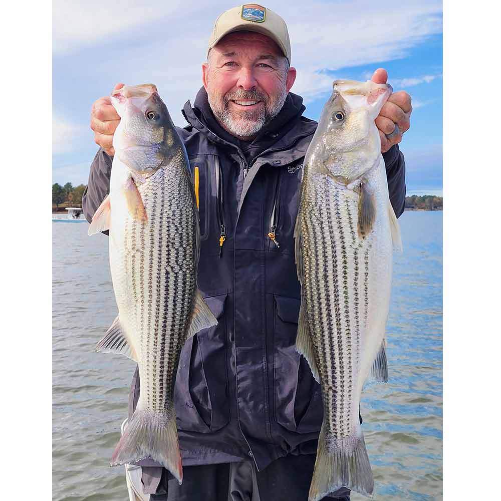 Captain Chris Nichols wiht a nice pair of Wateree striper