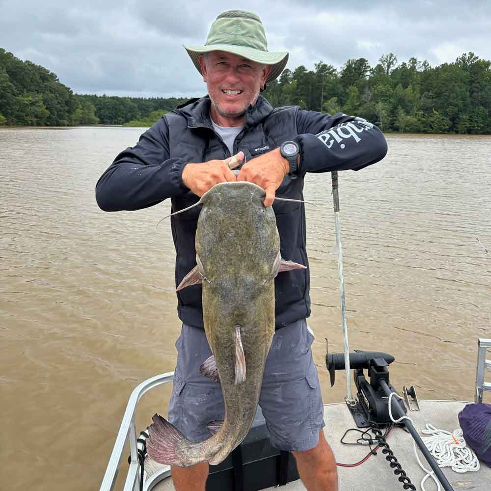 Rodger Taylor with a big one pulled from the mud